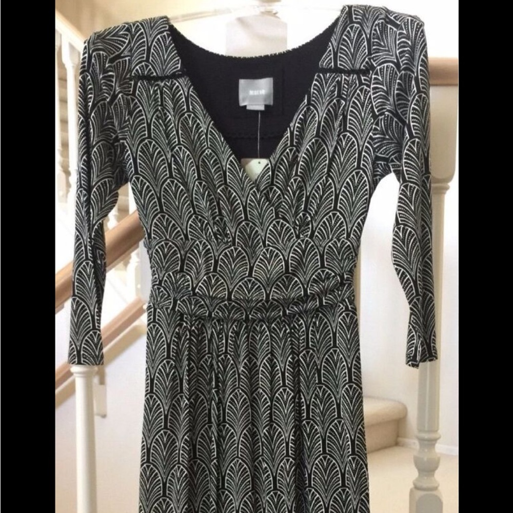 Anthropologie Mauve dress with soft fabric and elastic at the waist and wrist